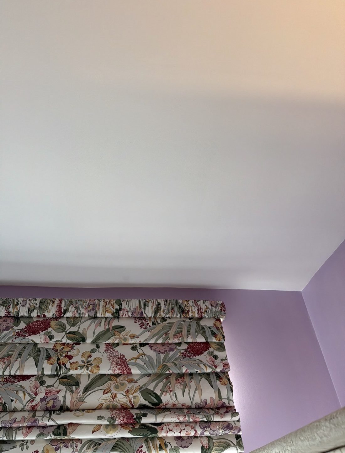 A bedroom ceiling after RF Custom Painting rebuilt, patched and painted it smooth